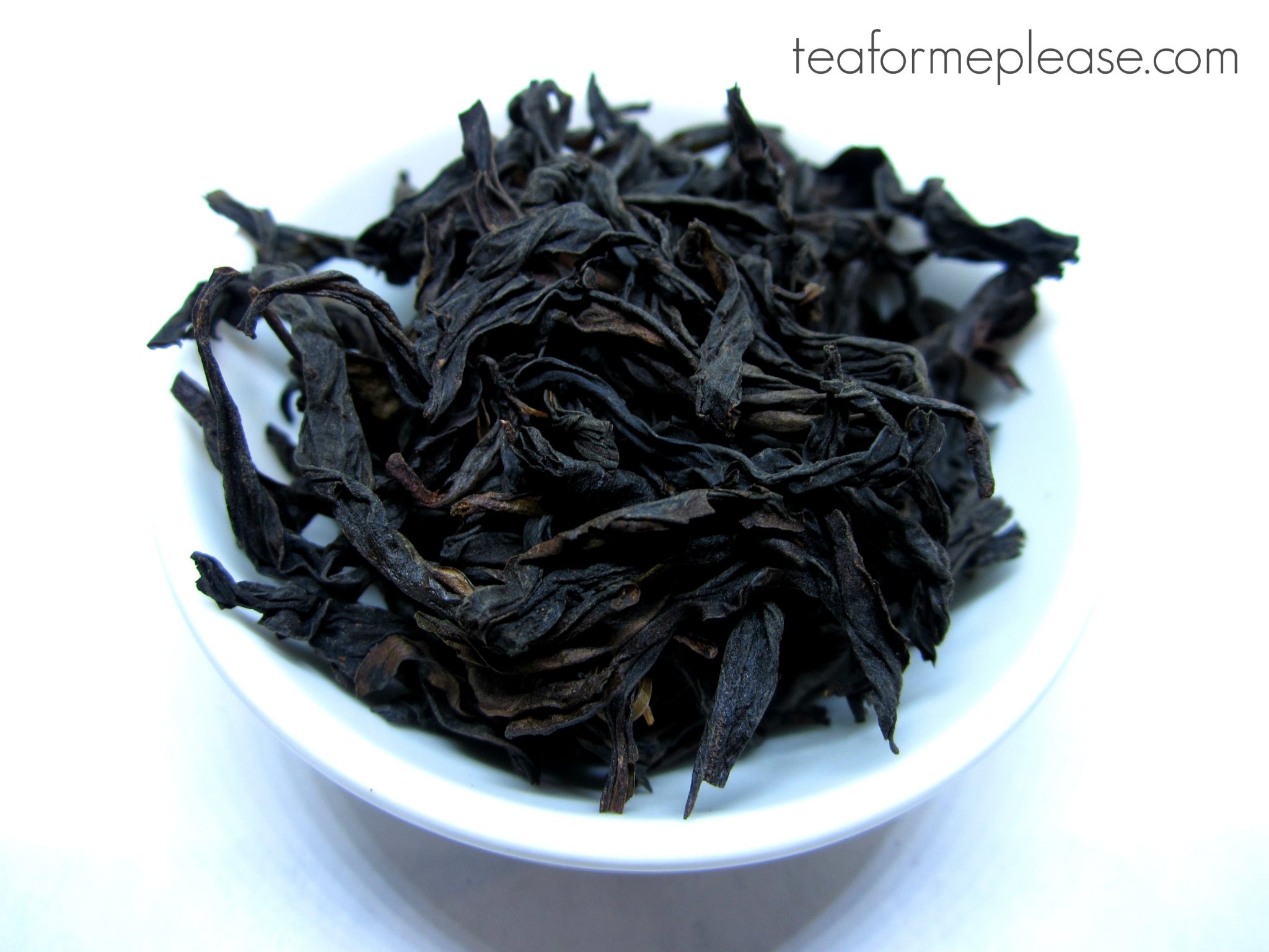 Tie Luo Han oolong leaves on a white dish