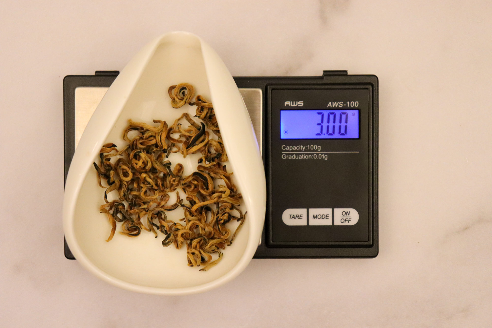 Weigh Your Tea Leaves
