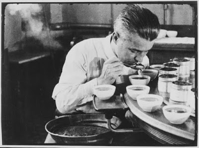 A federal tea taster sipping tea from a spoon - All About the Tea Importation Act of 1897