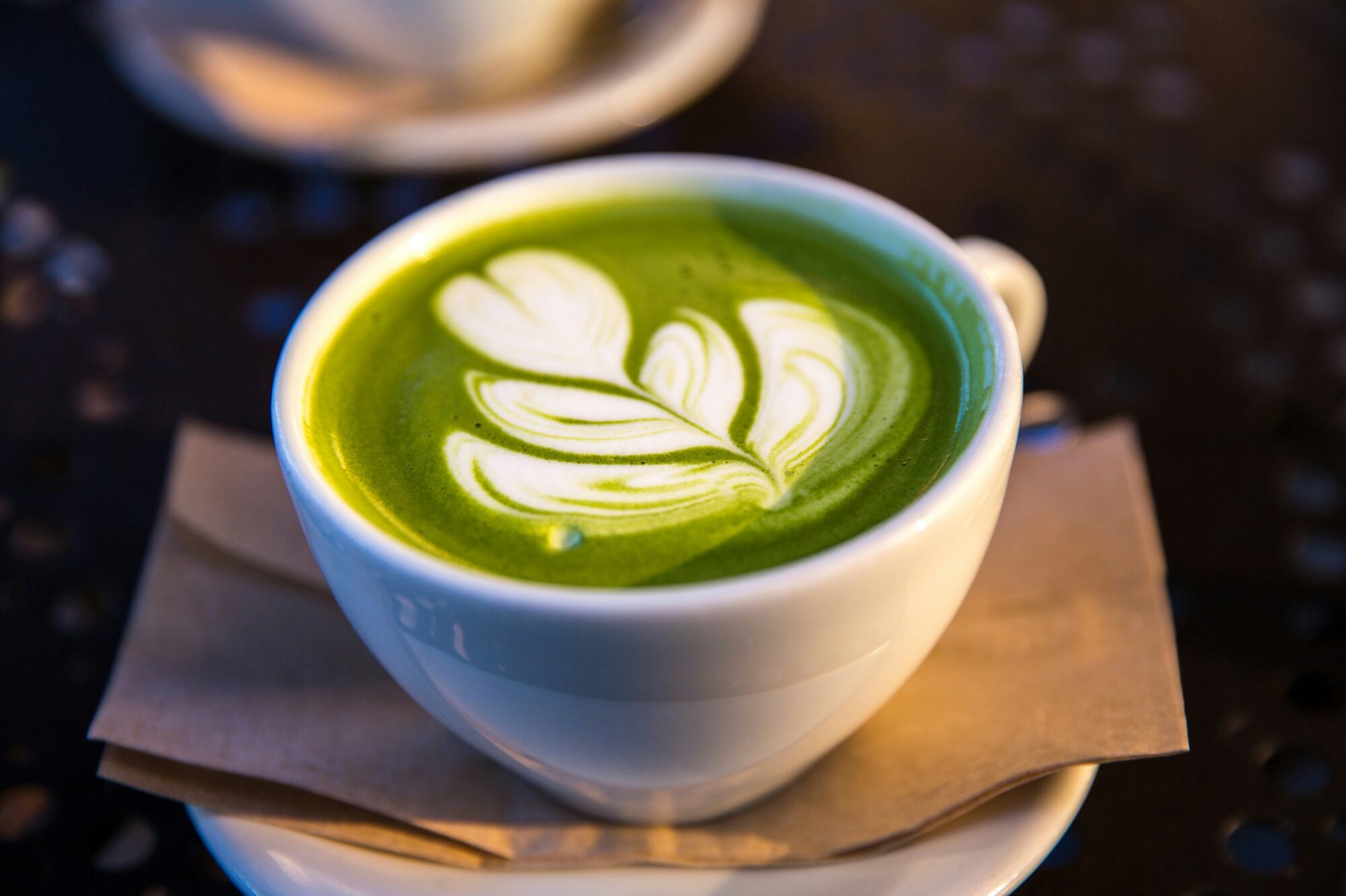 Does Matcha Really Make Your Hair Fall Out? - a matcha latte in a white mug